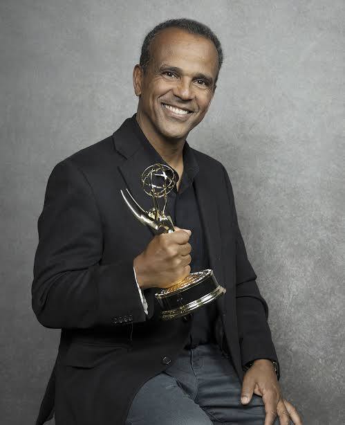 Filmmaker Waldo Cabrera holding his Emmy Award